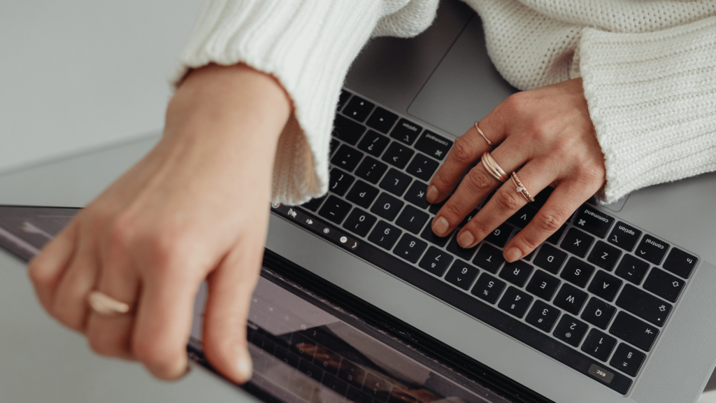 closeup of woman looking at laptop