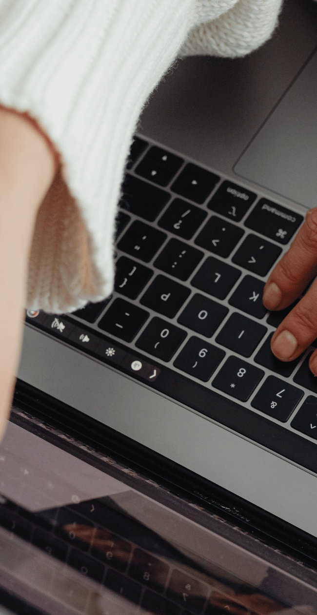 closeup of woman looking at laptop