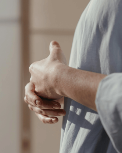 woman touching hands