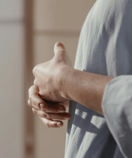 woman touching hands